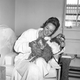 Illustration for article titled Here's a Lady Taking Her Cat for a Swim